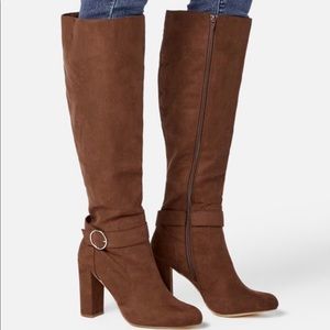 Brown heeled knee high boots